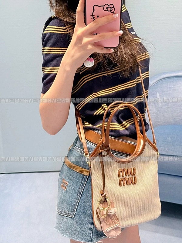 미우미우아이비캔버스토트백 20260315-125450-026루.jpg