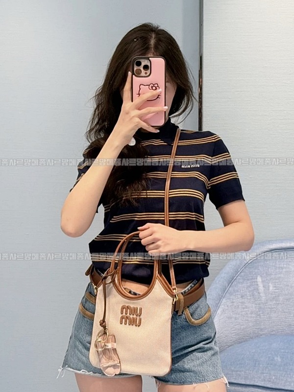 미우미우아이비캔버스토트백 20260315-125450-027루.jpg