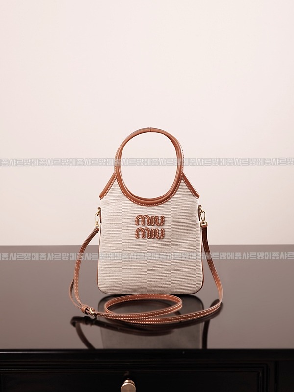 미우미우아이비캔버스토트백 20260315-125446-005루.jpg