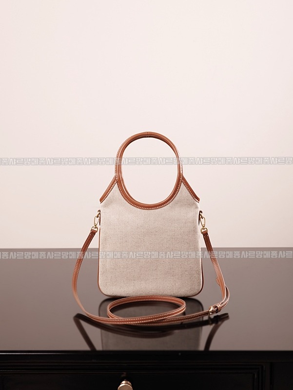 미우미우아이비캔버스토트백 20260315-125445-002루.jpg