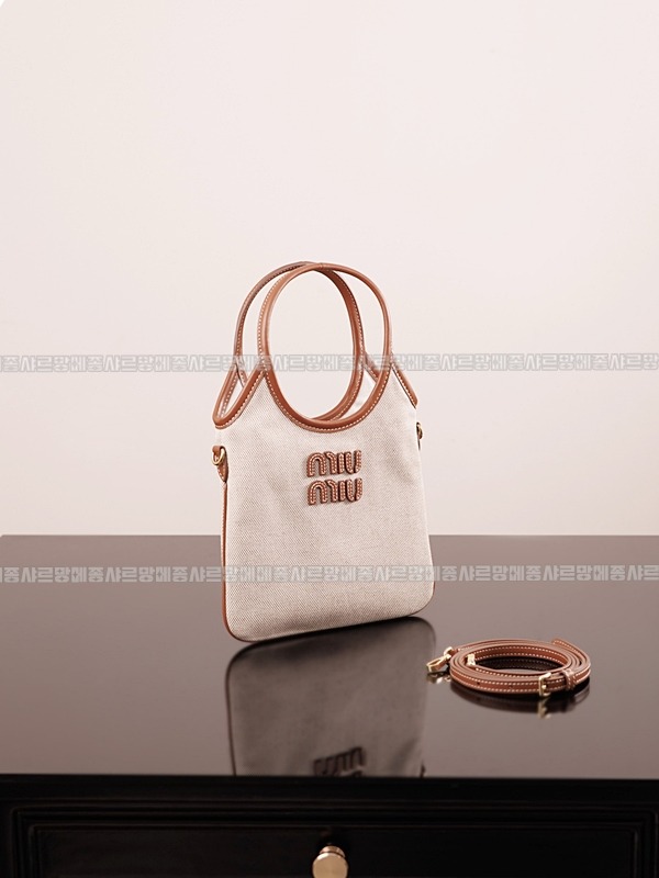 미우미우아이비캔버스토트백 20260315-125446-008루.jpg