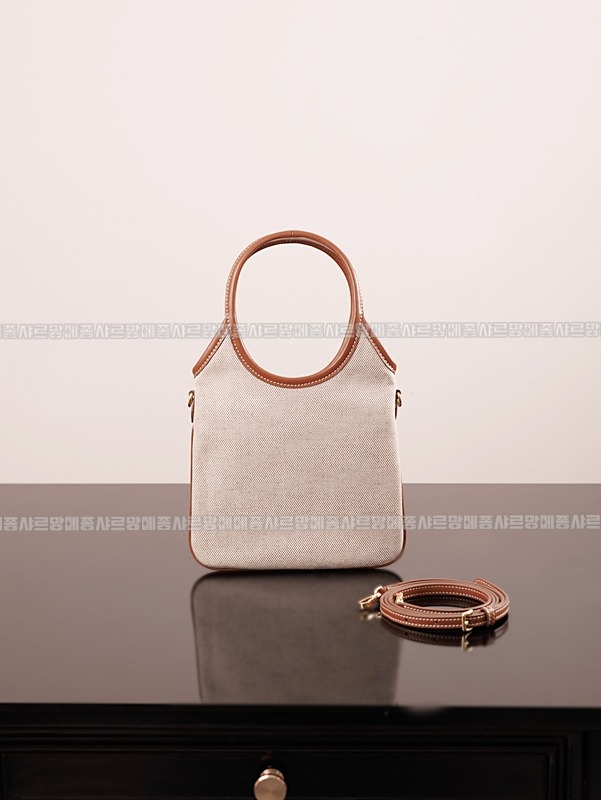 미우미우아이비캔버스토트백 20260315-125447-009루.jpg