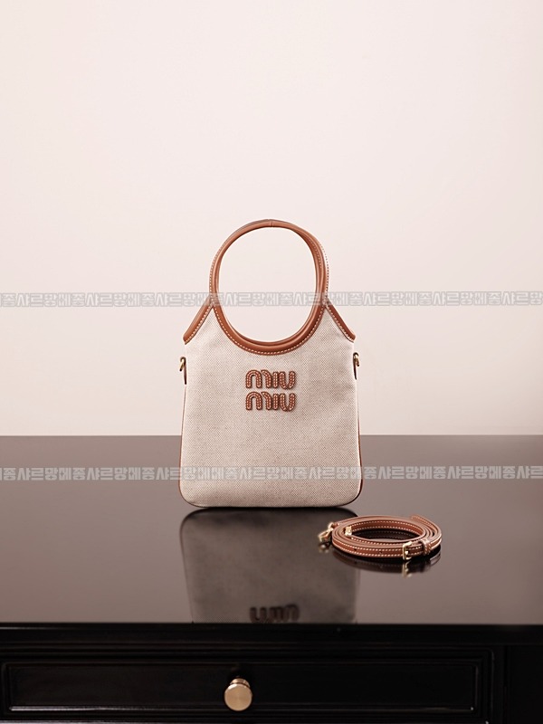 미우미우아이비캔버스토트백 20260315-125446-007루.jpg