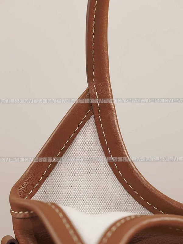 미우미우아이비캔버스토트백 20260315-125449-019루.jpg