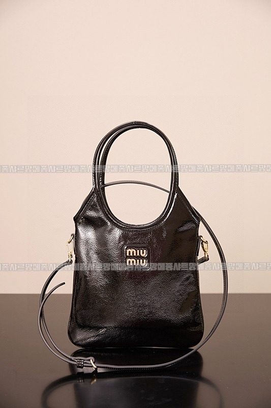 미우미우아이비캔버스토트백 20260315-125736-001루.jpg