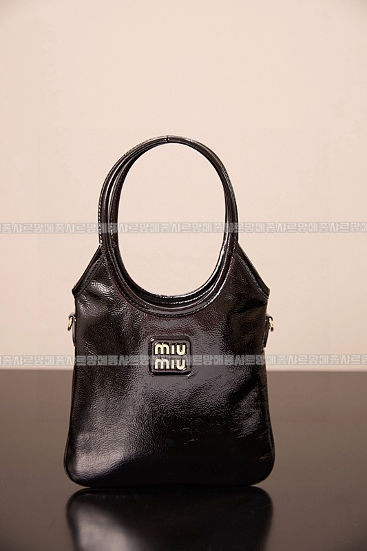 미우미우아이비캔버스토트백 20260315-125736-002루.jpg