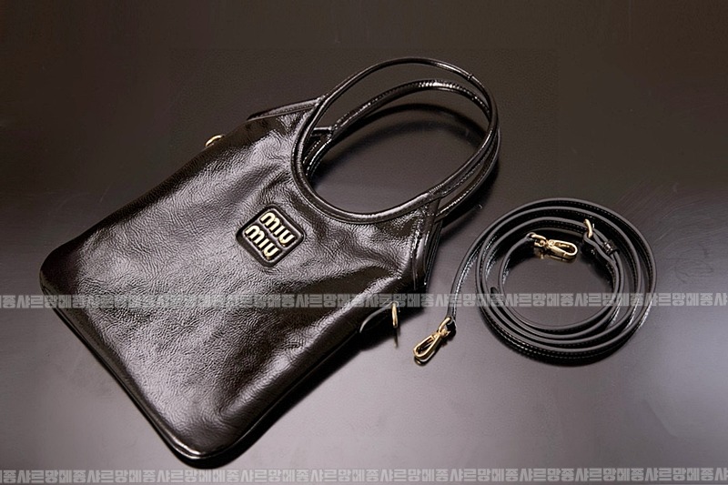 미우미우아이비캔버스토트백 20260315-125737-005루.jpg