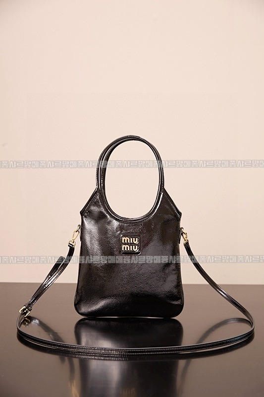 미우미우아이비캔버스토트백 20260315-125736-003루.jpg