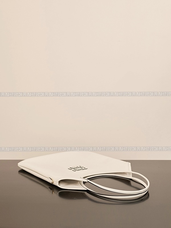 미우미우아이비캔버스토트백 20260315-130502-007루.jpg