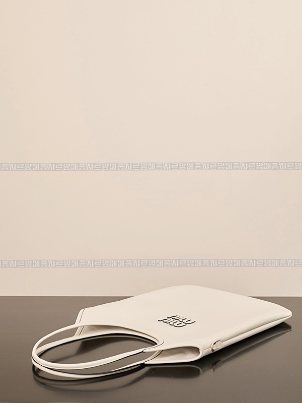 미우미우아이비캔버스토트백 20260315-130502-009루.jpg