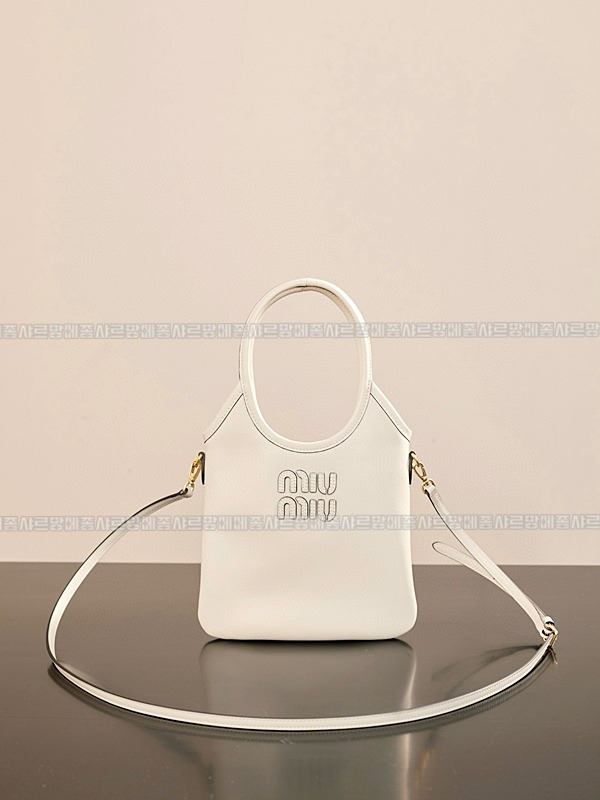 미우미우아이비캔버스토트백 20260315-131555-003루.jpg