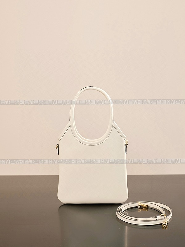 미우미우아이비캔버스토트백 20260315-131556-005루.jpg