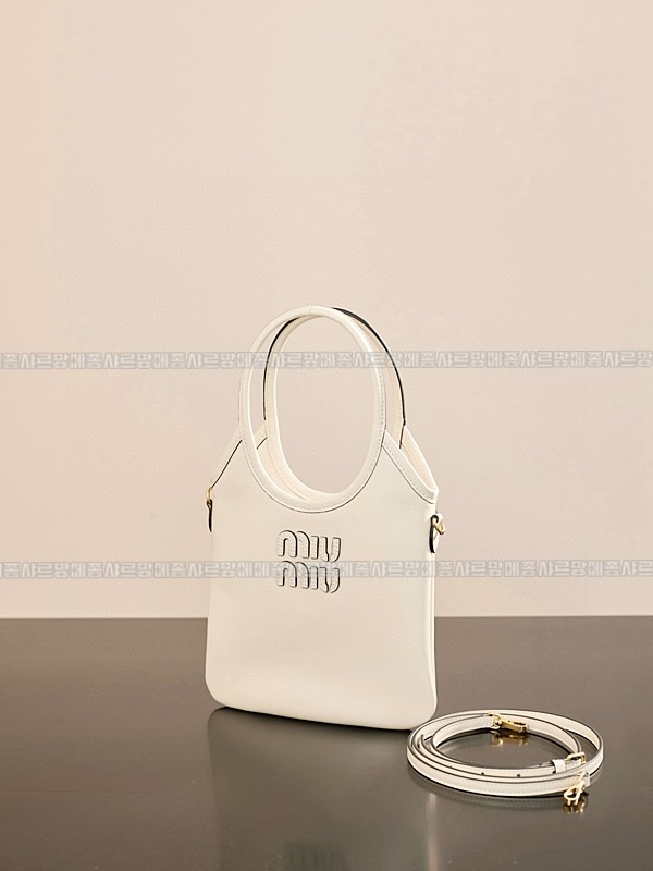 미우미우아이비캔버스토트백 20260315-131556-006루.jpg