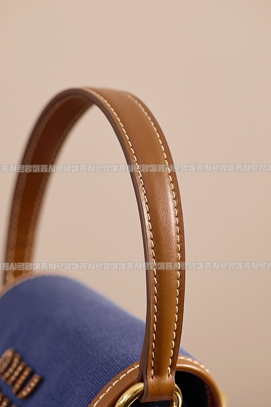 미우미우켄버스및가죽백팩 20260315-133114-010루.jpg