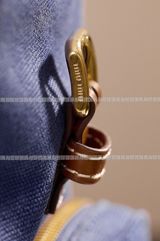 미우미우켄버스및가죽백팩 20260315-133115-012루.jpg