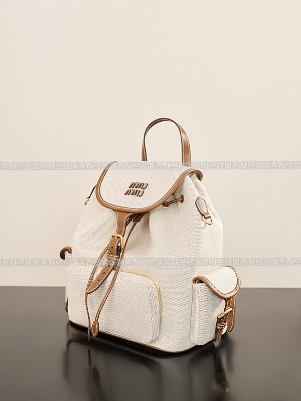 미우미우켄버스가죽백팩 20260315-135414-002루.jpg