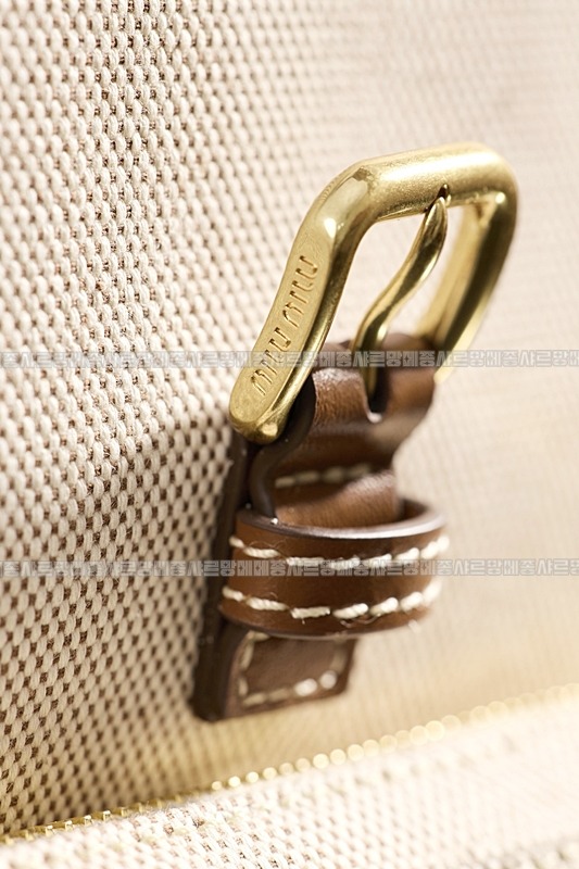 미우미우켄버스가죽백팩 20260315-135416-016루.jpg