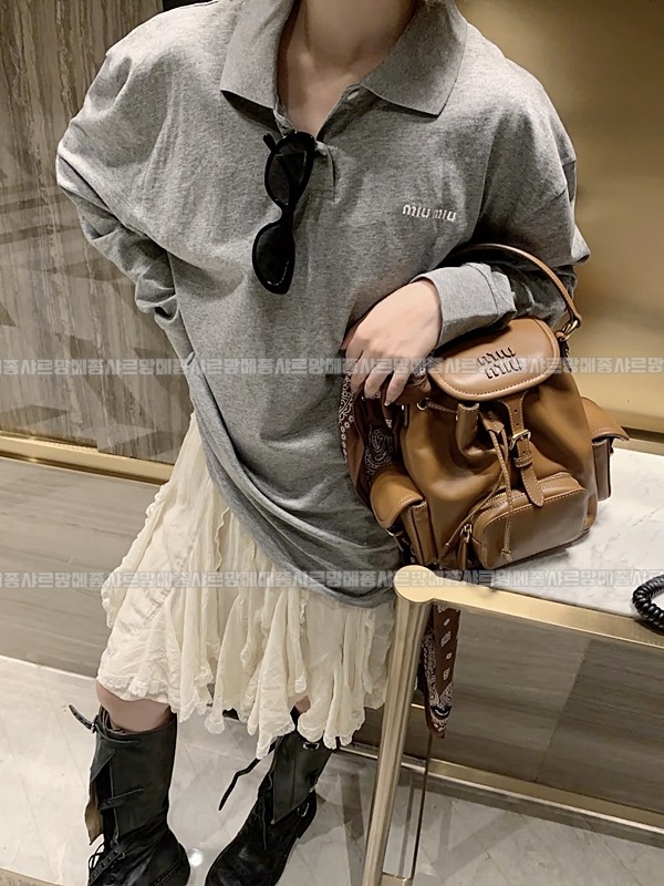 미우미우켄버스가죽백팩 20260315-141129-001루.jpg