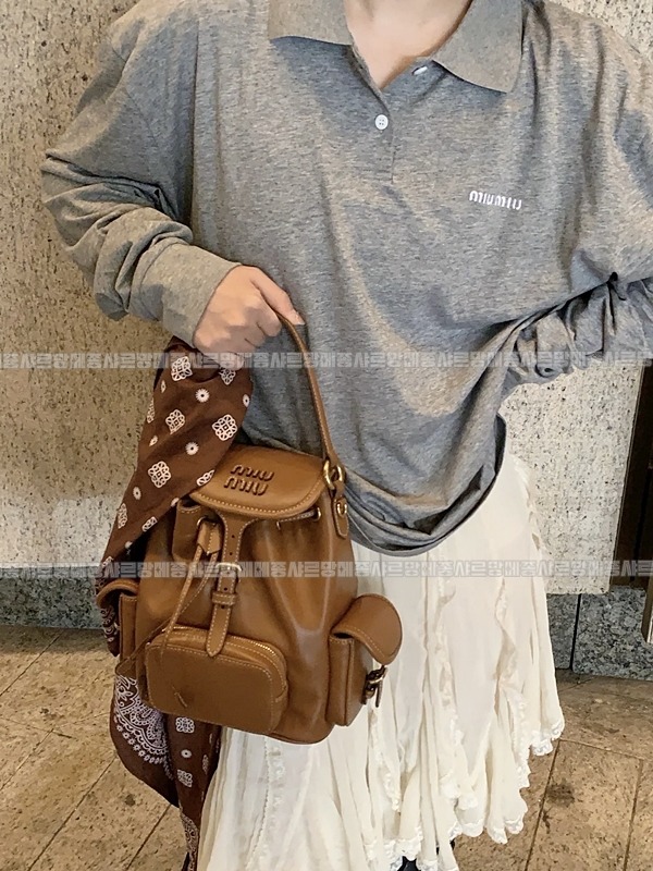 미우미우켄버스가죽백팩 20260315-141129-003루.jpg