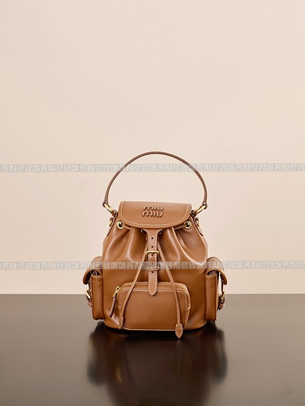 미우미우켄버스가죽백팩 20260315-140954-001루.jpg