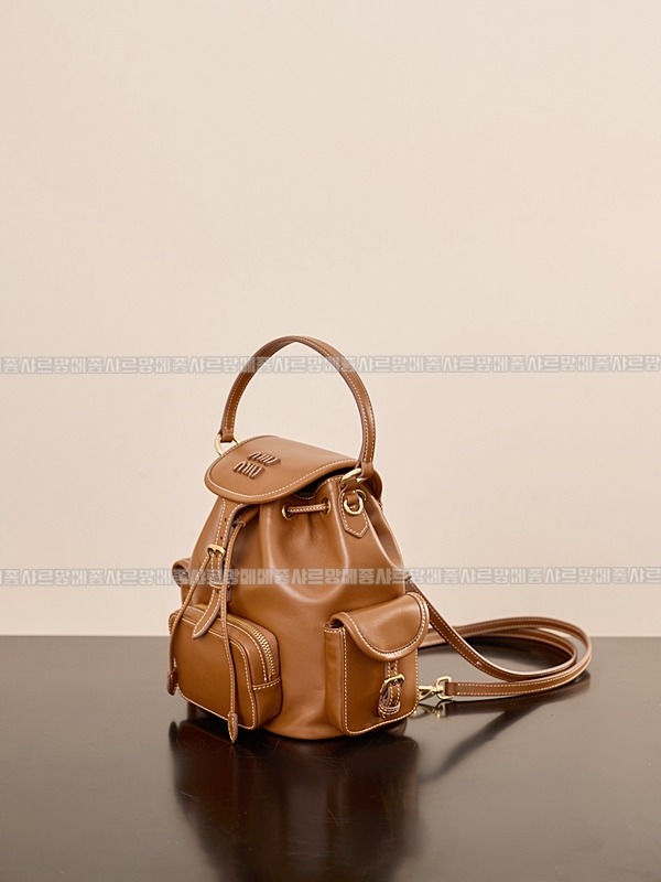 미우미우켄버스가죽백팩 20260315-140954-002루.jpg