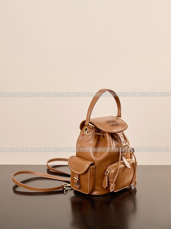 미우미우켄버스가죽백팩 20260315-140954-006루.jpg