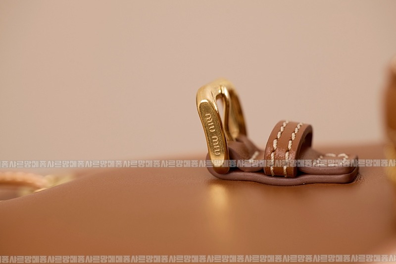 미우미우켄버스가죽백팩 20260315-140957-022루.jpg