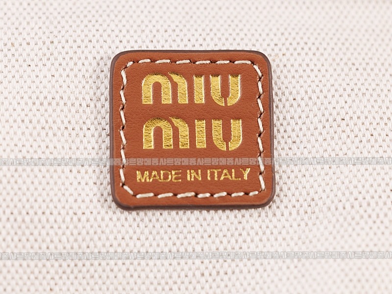 미우미우캔버스가죽백팩 20260315-152841-019루.jpg