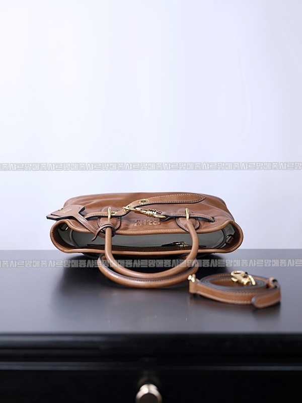 미우미우아방뛰르나파가죽백  20260316-112135-004루.jpg