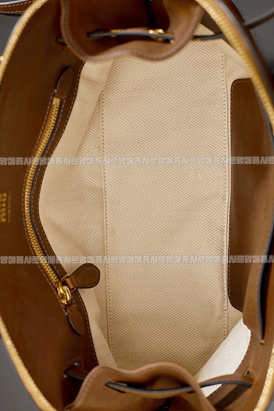 미우미우아방뛰르나파가죽백  20260316-143906-010루.jpg