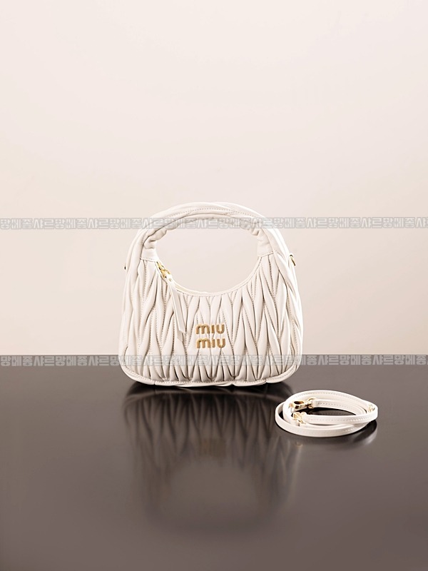 미우미우완더마테라세나파가죽호보백  20260316-150720-001루.jpg