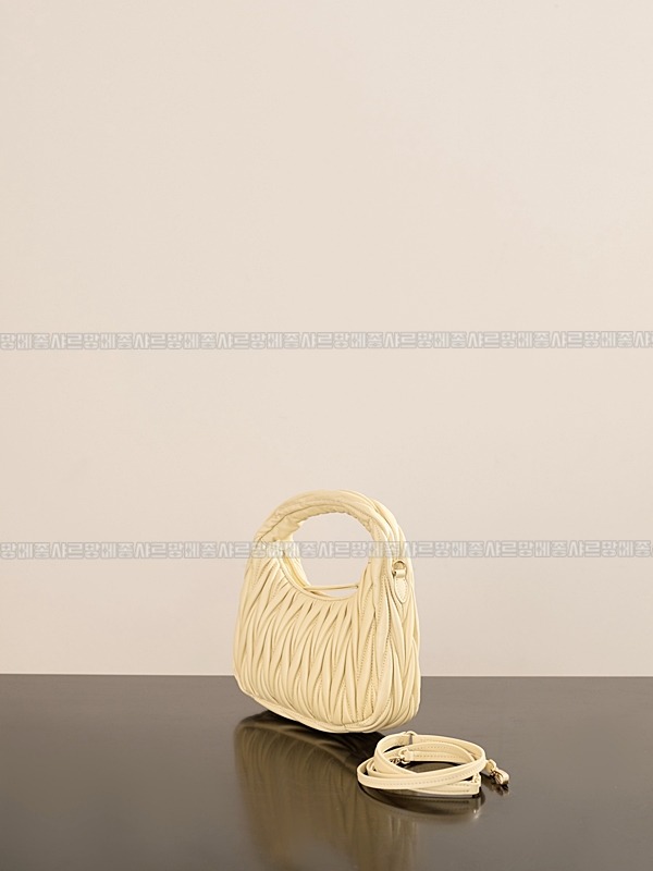 미우미우완더마테라세나파가죽호보백 20260317-105342-002루.jpg