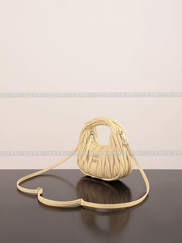 미우미우완더마테라세나파가죽호보백 20260317-115417-002루.jpg