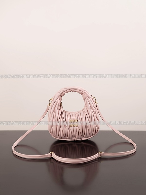 미우미우완더마테라세나파가죽호보백 20260317-122732-001루.jpg