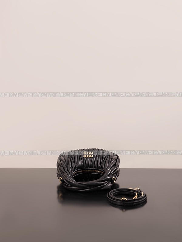 미우미우완더마테라세나파가죽호보백 20260317-123435-007루.jpg