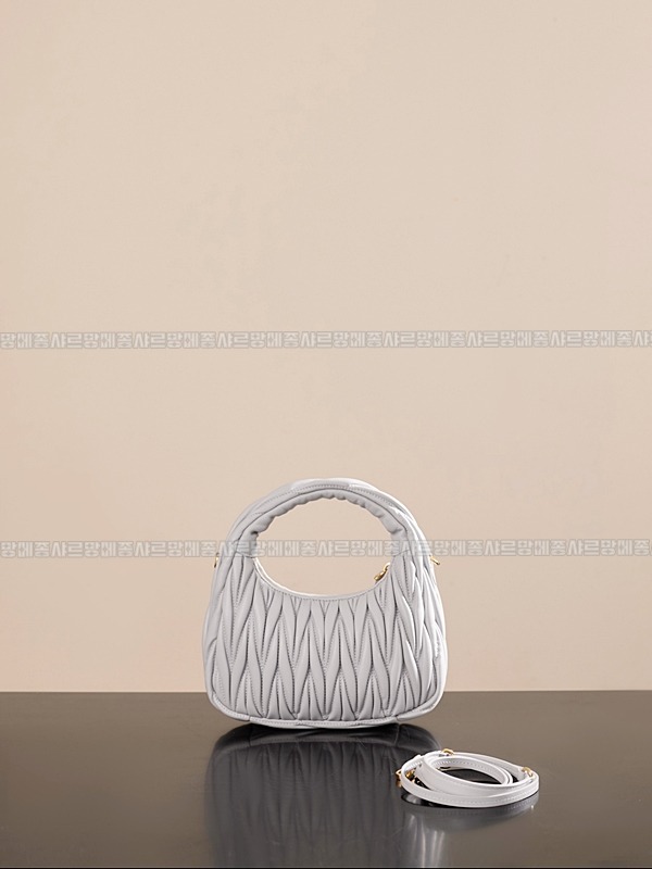 미우미우완더마테라세나파가죽호보백 20260317-123847-003루.jpg