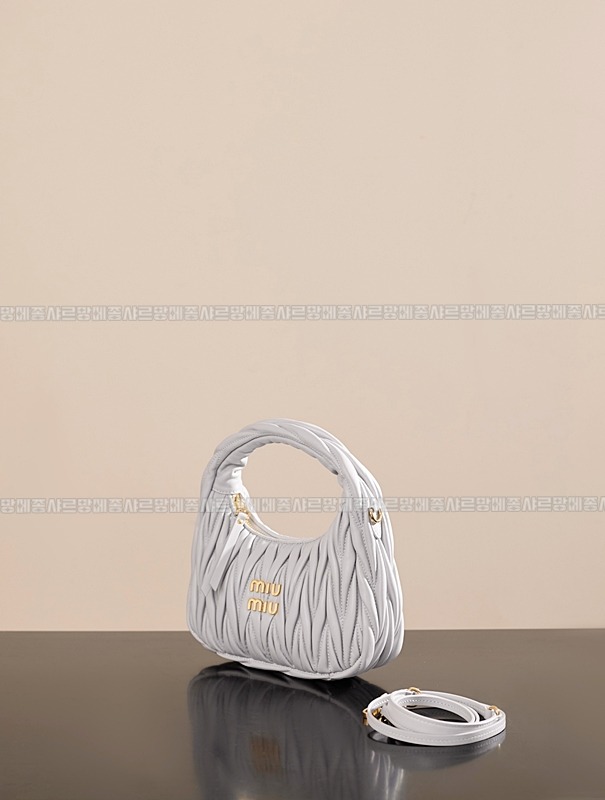 미우미우완더마테라세나파가죽호보백 20260317-123846-002루.jpg