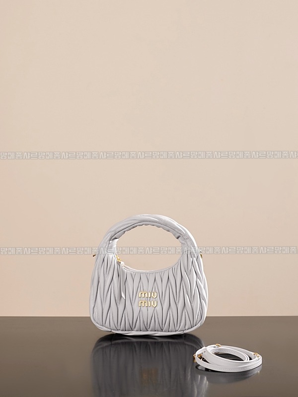 미우미우완더마테라세나파가죽호보백 20260317-123846-001루.jpg