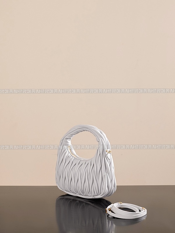 미우미우완더마테라세나파가죽호보백 20260317-123847-006루.jpg