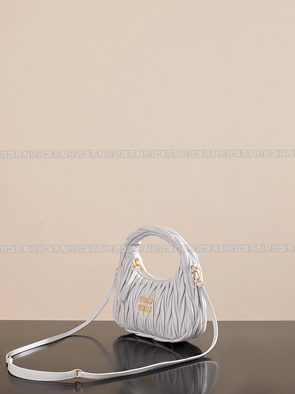 미우미우완더마테라세나파가죽호보백 20260317-123847-005루.jpg