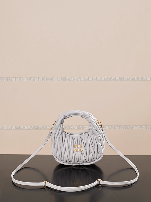 미우미우완더마테라세나파가죽호보백 20260317-124138-003루.jpg