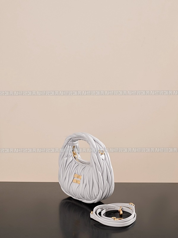 미우미우완더마테라세나파가죽호보백 20260317-124138-002루.jpg