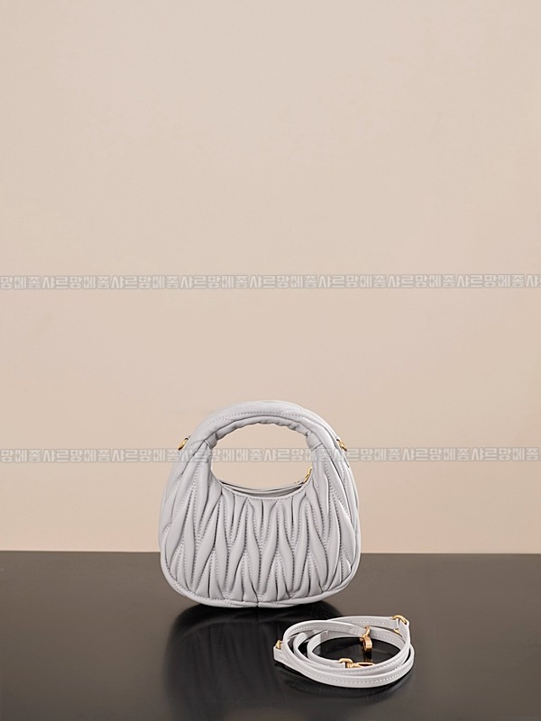 미우미우완더마테라세나파가죽호보백 20260317-124138-004루.jpg