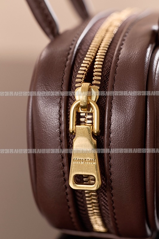 미우미우레더마이크로보백 20260317-130820-013루.jpg