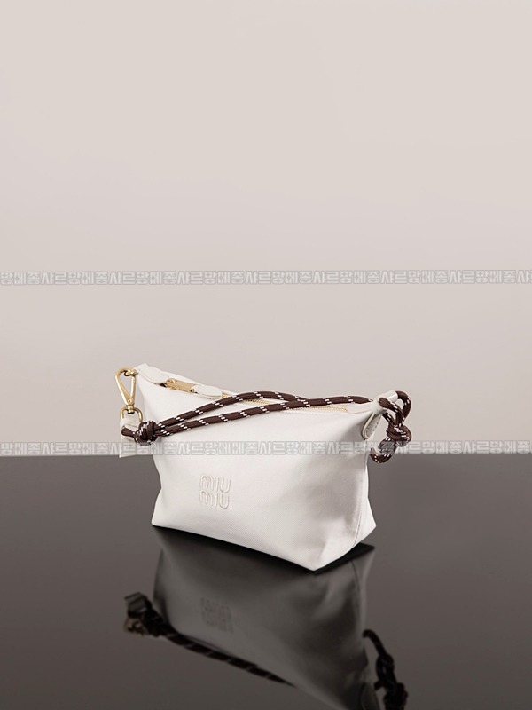 미우미우게버딘파우치 20260317-161315-002루.jpg