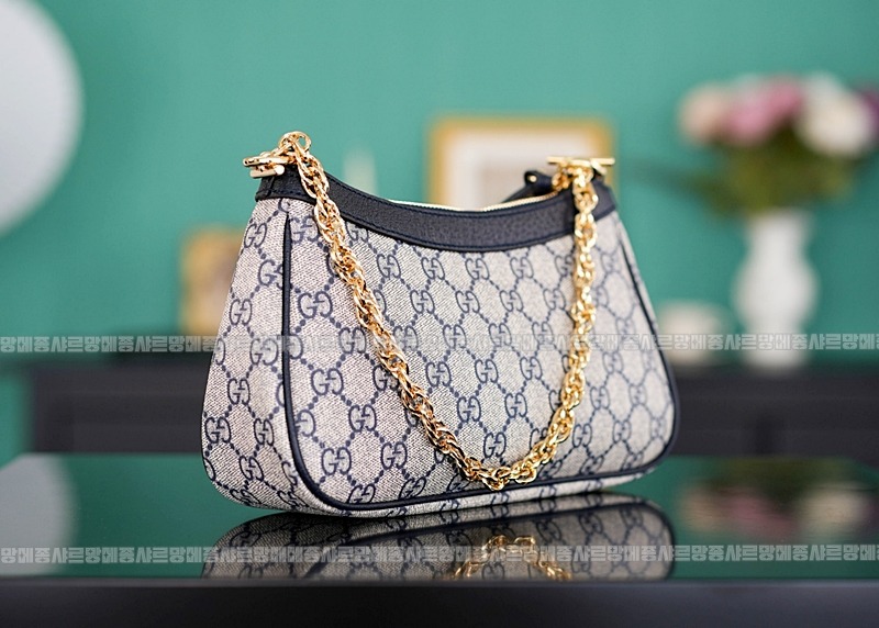 구찌오피디아스ㅡ트로베리참스몰체인숄더백 20260320-143026-005루.jpg