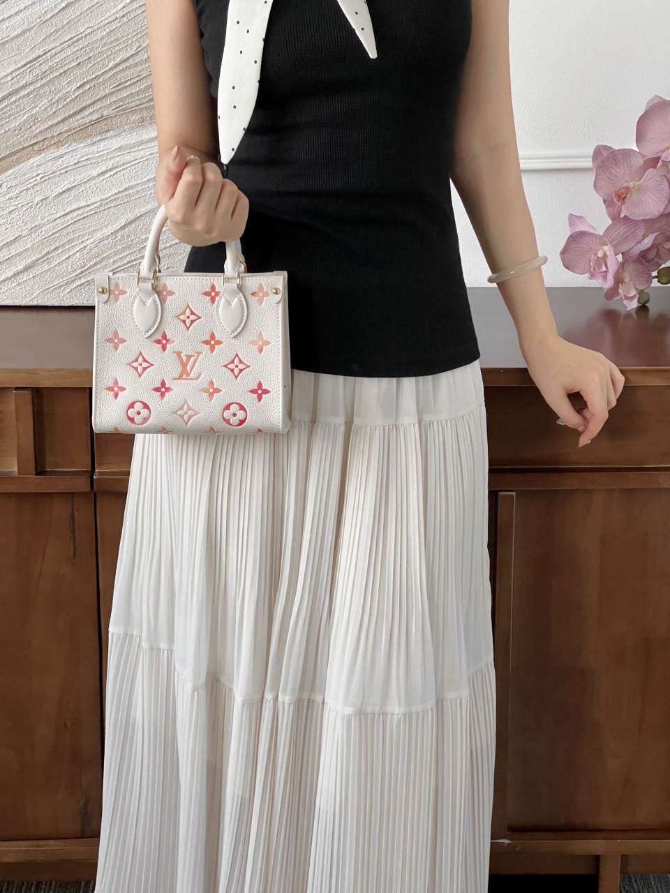 루이비통 온더고 BB 선라이즈 아쿠아렐